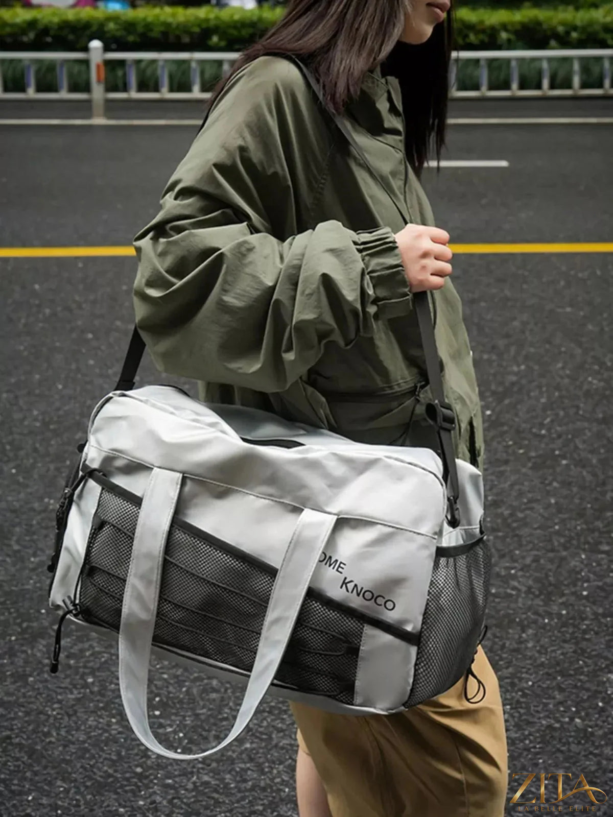 Zita La Belle Elite lightweight duffel bag with mesh pockets, durable fabric, and adjustable shoulder strap for travel and gym use.