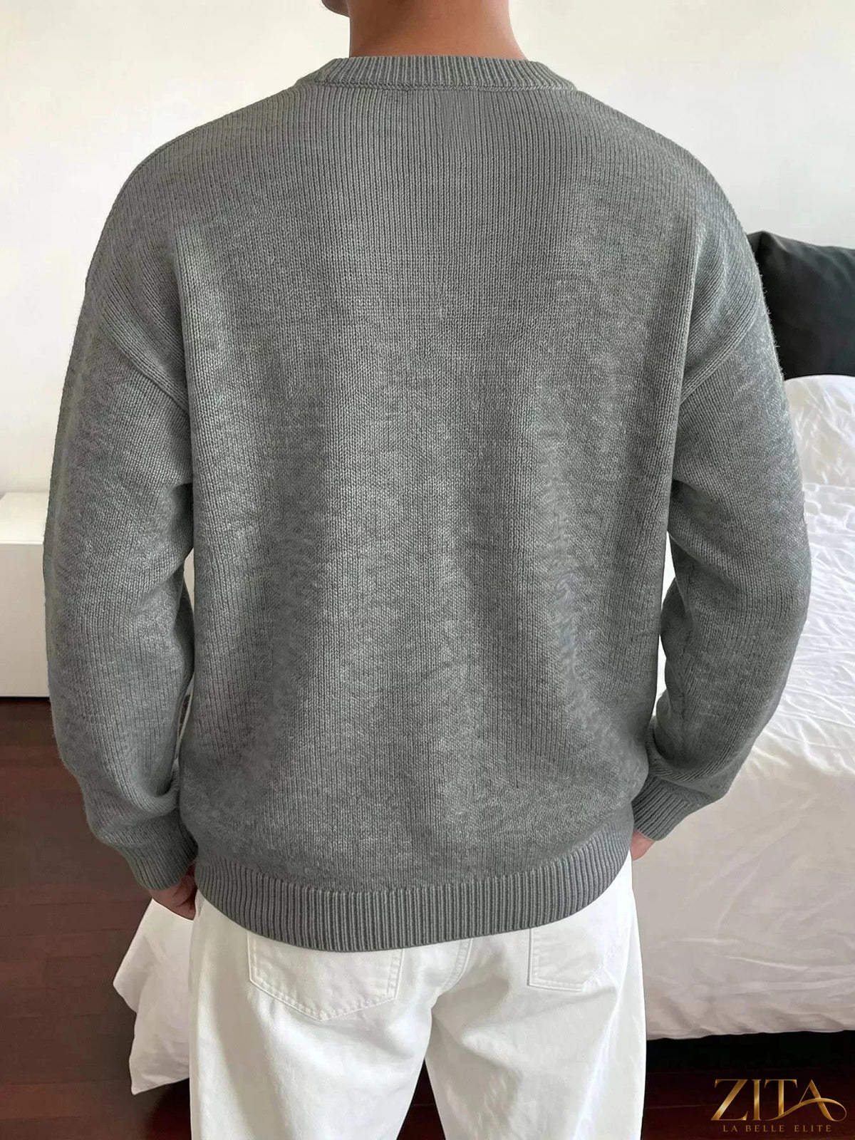 Star-patterned dropped shoulder sweater by Zita La Belle Elite, featuring a cozy knit with celestial star design.