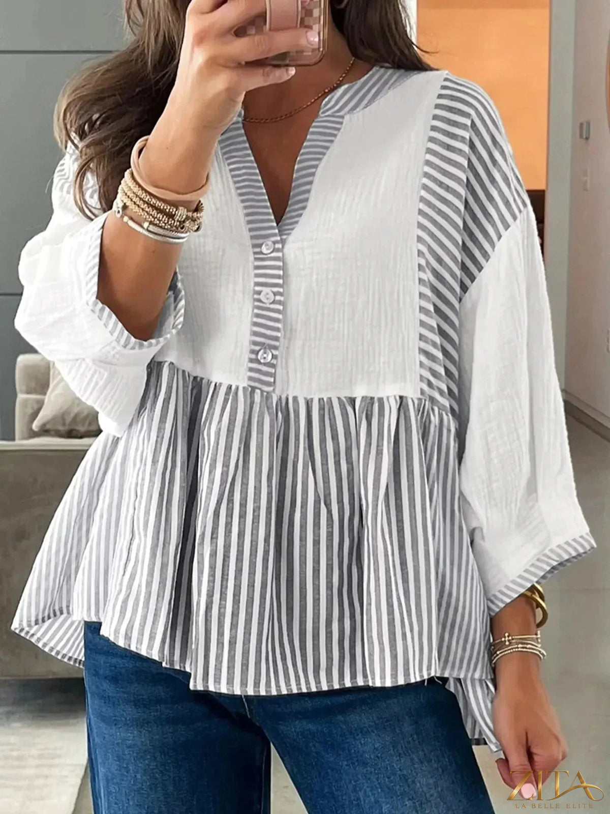 Zita La Belle Elite striped button detail blouse with long sleeves and classic collar, featuring vertical stripe pattern and button accents.