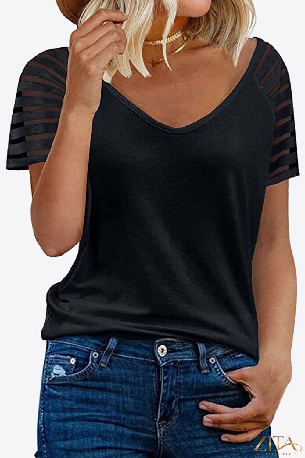 V-neck raglan sleeve tee by Trendsi featuring a casual fit and contrasting sleeve colors, displayed on a neutral background.