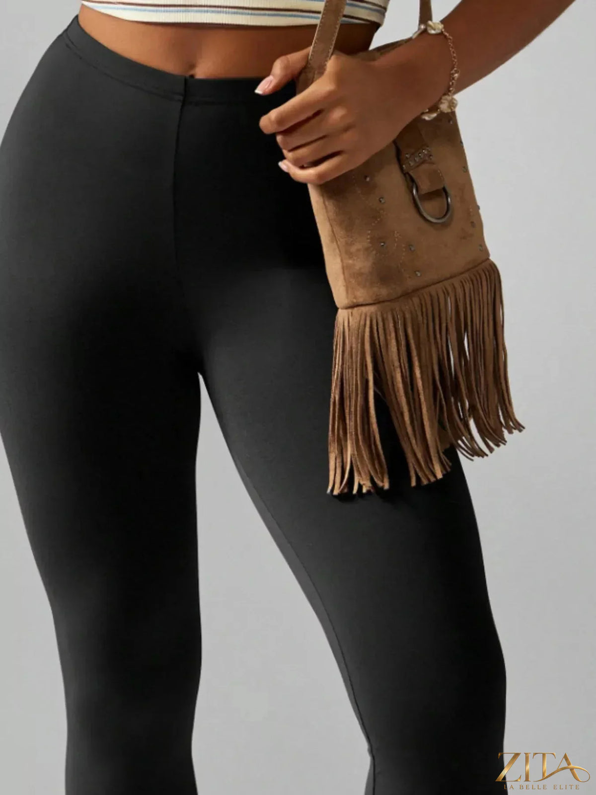 Zita La Belle Elite high-waisted active capri leggings shown in black, fitted with a wide waistband for workout and casual wear.