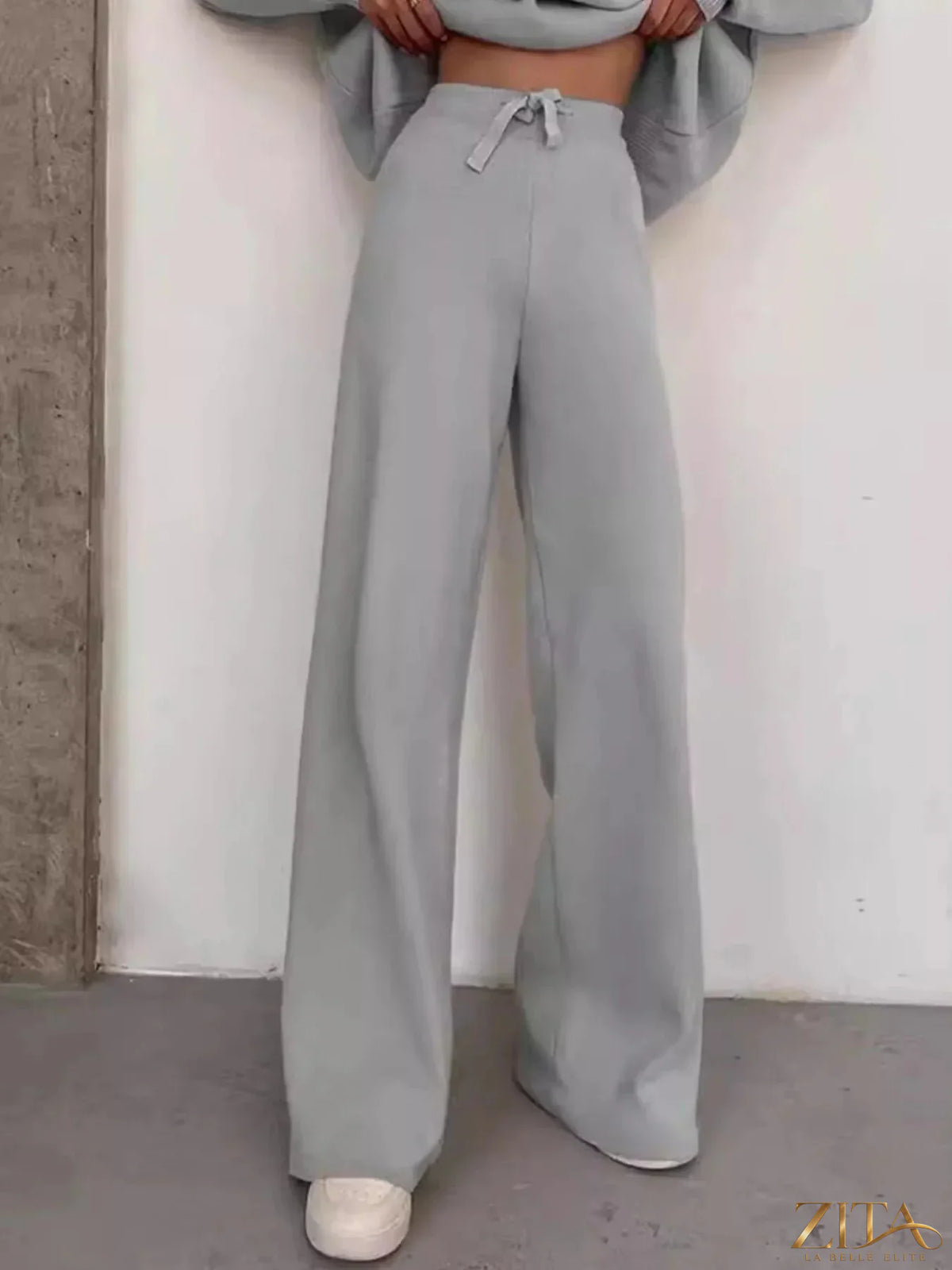 Plus size Trendsi turtleneck long sleeve sweater top and matching pants set, soft knit fabric in a cozy, full-length style.