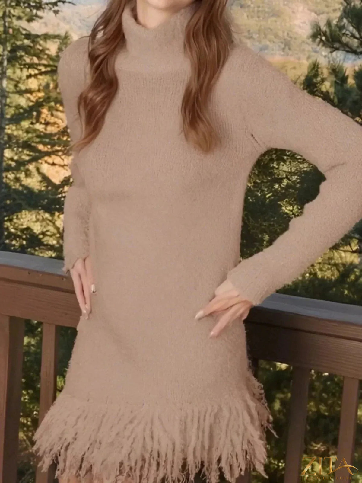 Long sleeve fringe turtleneck sweater dress by Trendsi featuring a cozy fit and stylish design with fringe detailing.