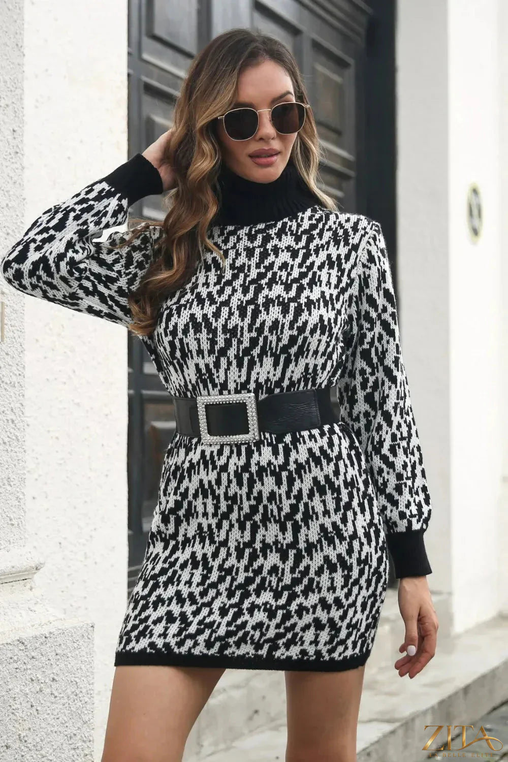 Heathered turtleneck mini sweater dress by Trendsi, featuring a cozy knit design and fitted silhouette, perfect for casual wear.