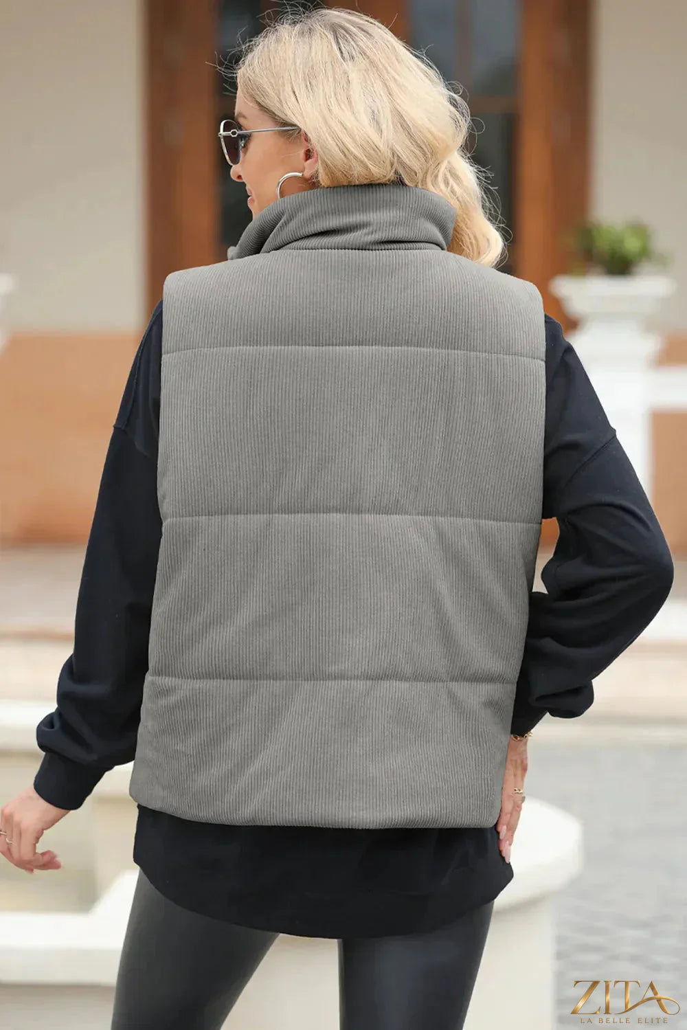Trendsi women's pocketed zip-up turtleneck vest coat with front pockets, black and cozy for layered winter style.
