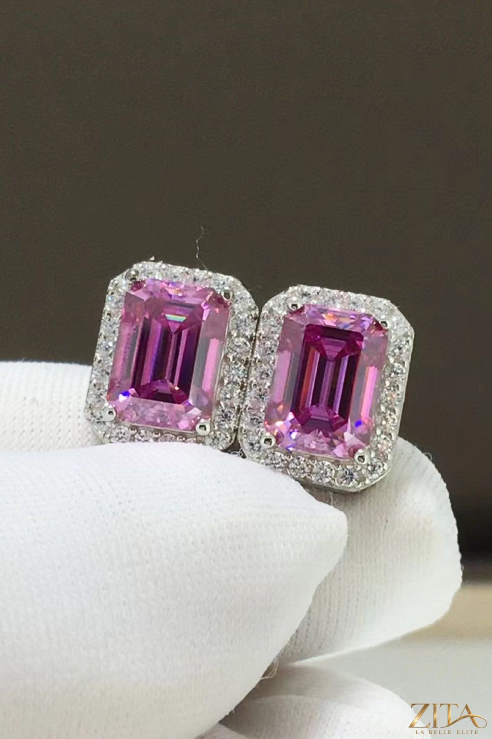 Shiny and elegant 2 carat moissanite stud earrings featuring a silver setting, perfect for sophisticated style.