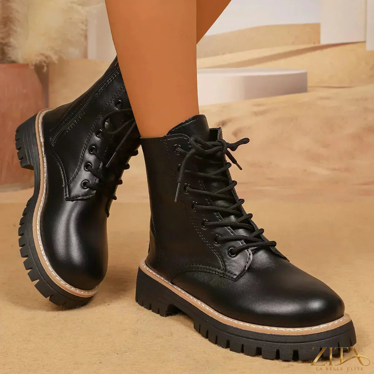 Black lace-up platform boots from Trendsi with chunky heels and rugged sole, stylish footwear for bold fashion statements.