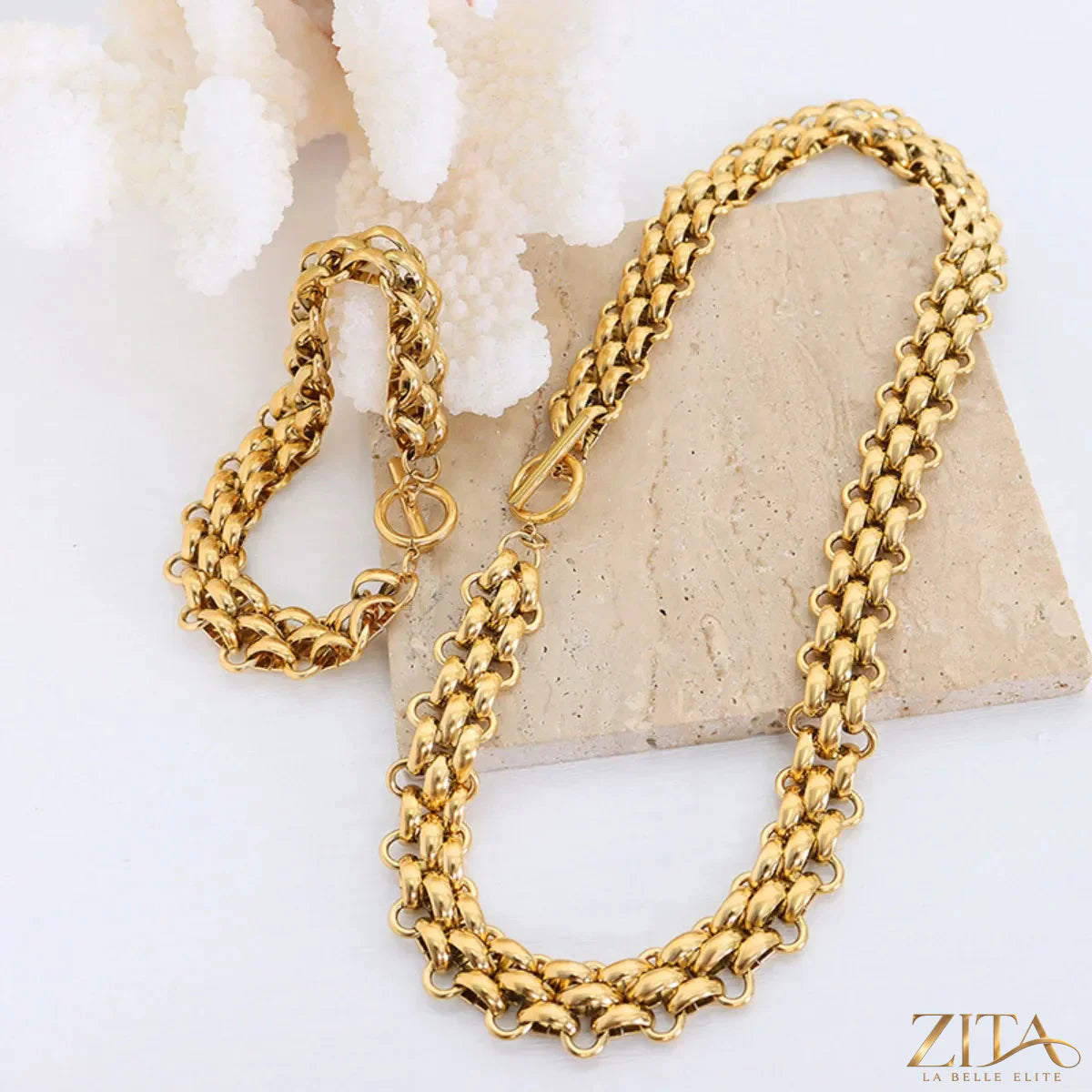 Gold chain link jewelry set featuring a matching necklace and bracelet with stylish, interconnected links by Trendsi.