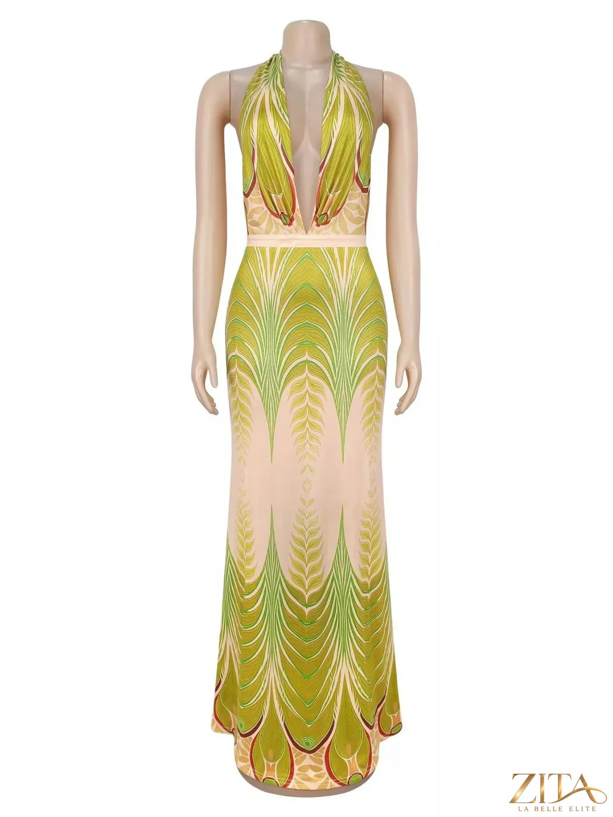 Elegant Zita La Belle Elite halter neck maxi dress with a gradient leaf print, flowing fabric and stylish design.