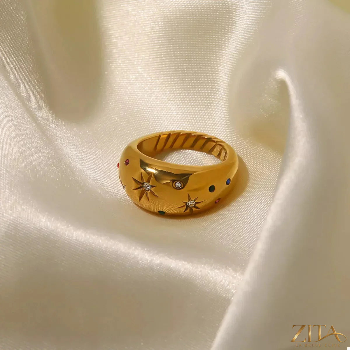 18K gold-plated zircon ring from Zita La Belle Elite with sparkling stones and elegant design, close-up view of the jewelry.