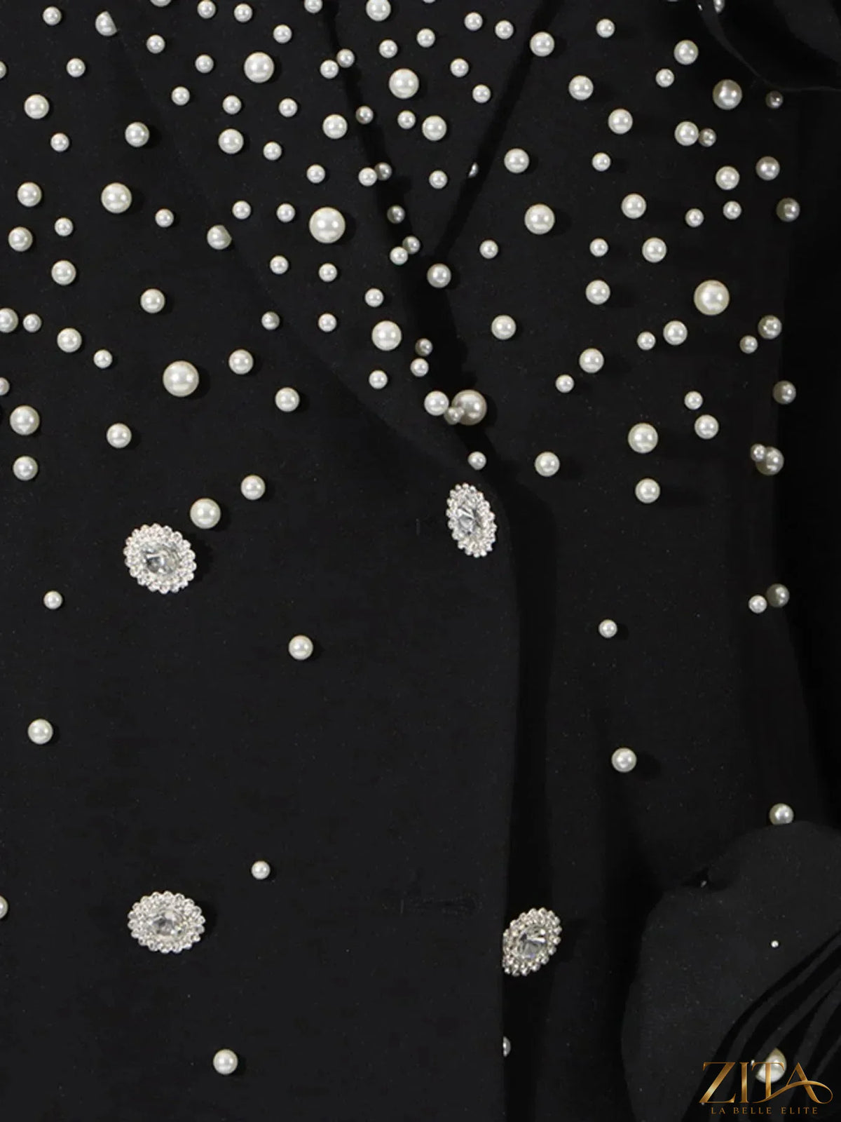 Pearl-embellished double-breasted blazer from Trendsi, featuring elegant pearl detailing on a tailored navy blazer.
