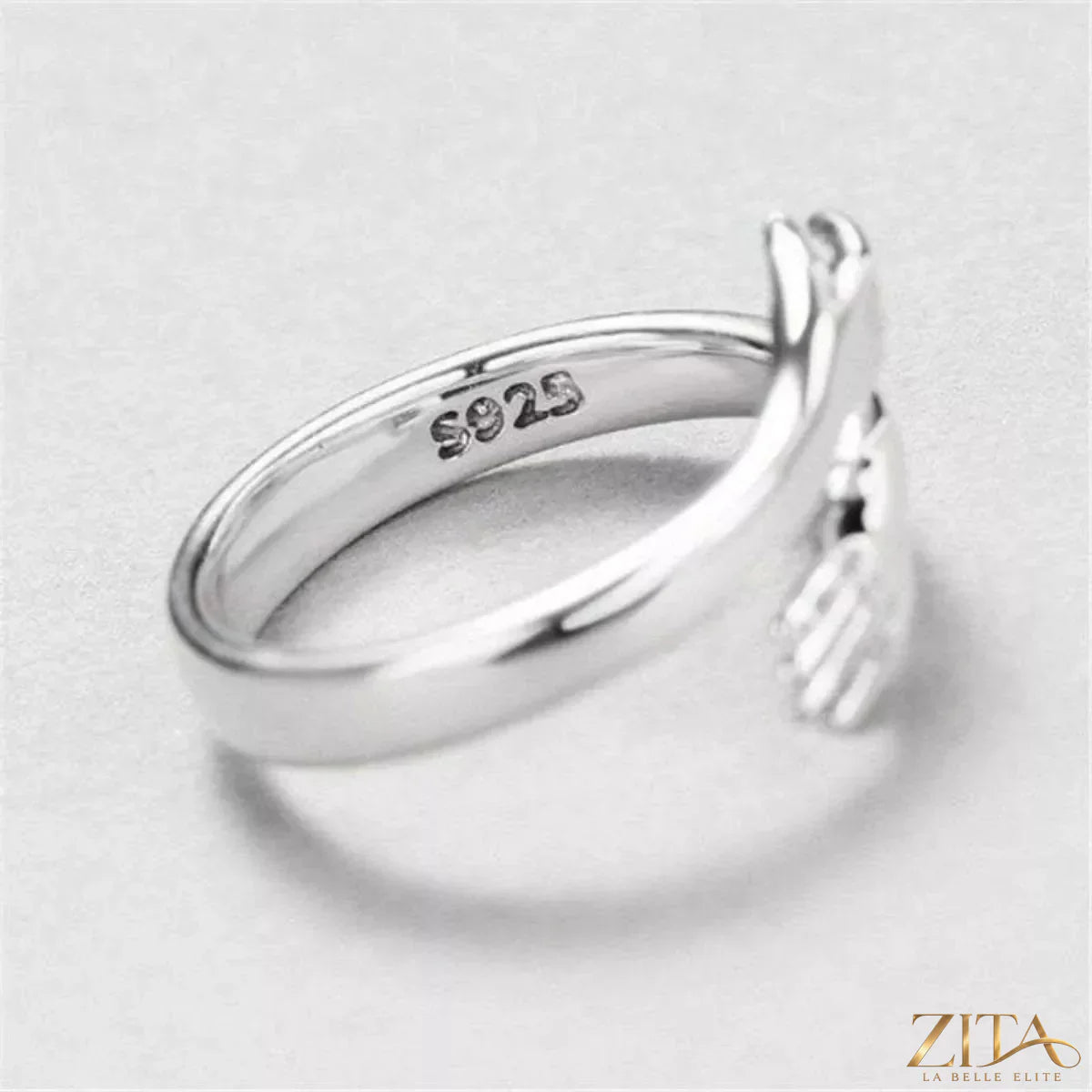 925 Sterling Silver Hug Bypass Ring by Zita La Belle Elite, close-up of the elegant silver ring with a smooth, bypass design.
