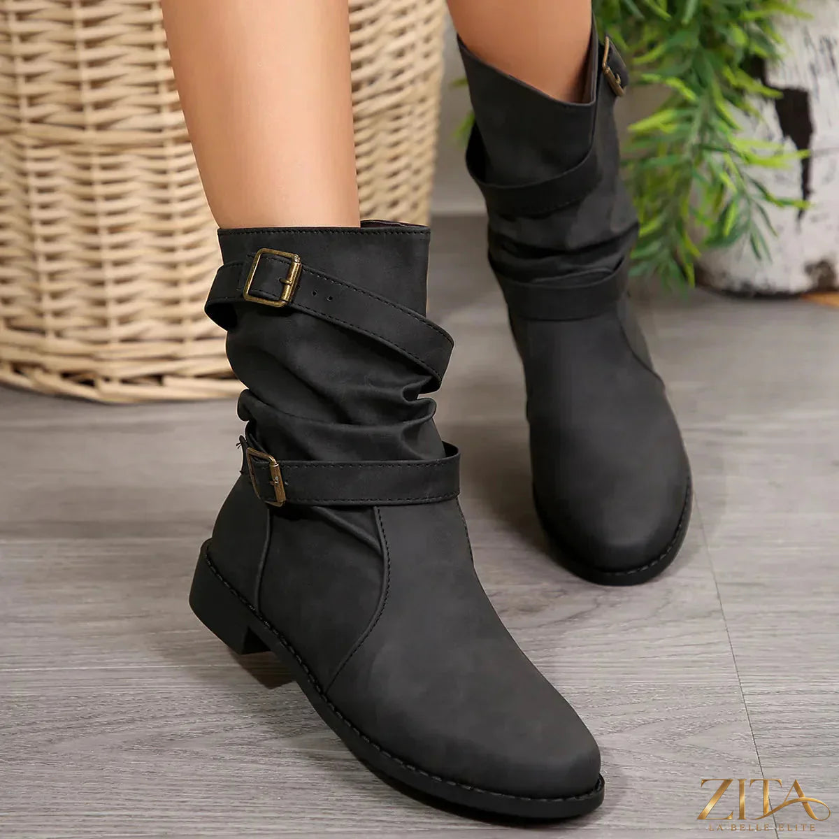 Mid-calf buckle strap boots by Zita La Belle Elite featuring leather material and stylish buckle accents.