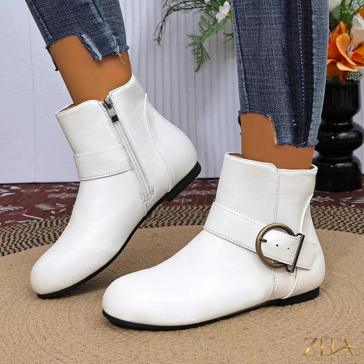 Round toe ankle boots by Trendsi featuring a sleek design and smooth leather finish.