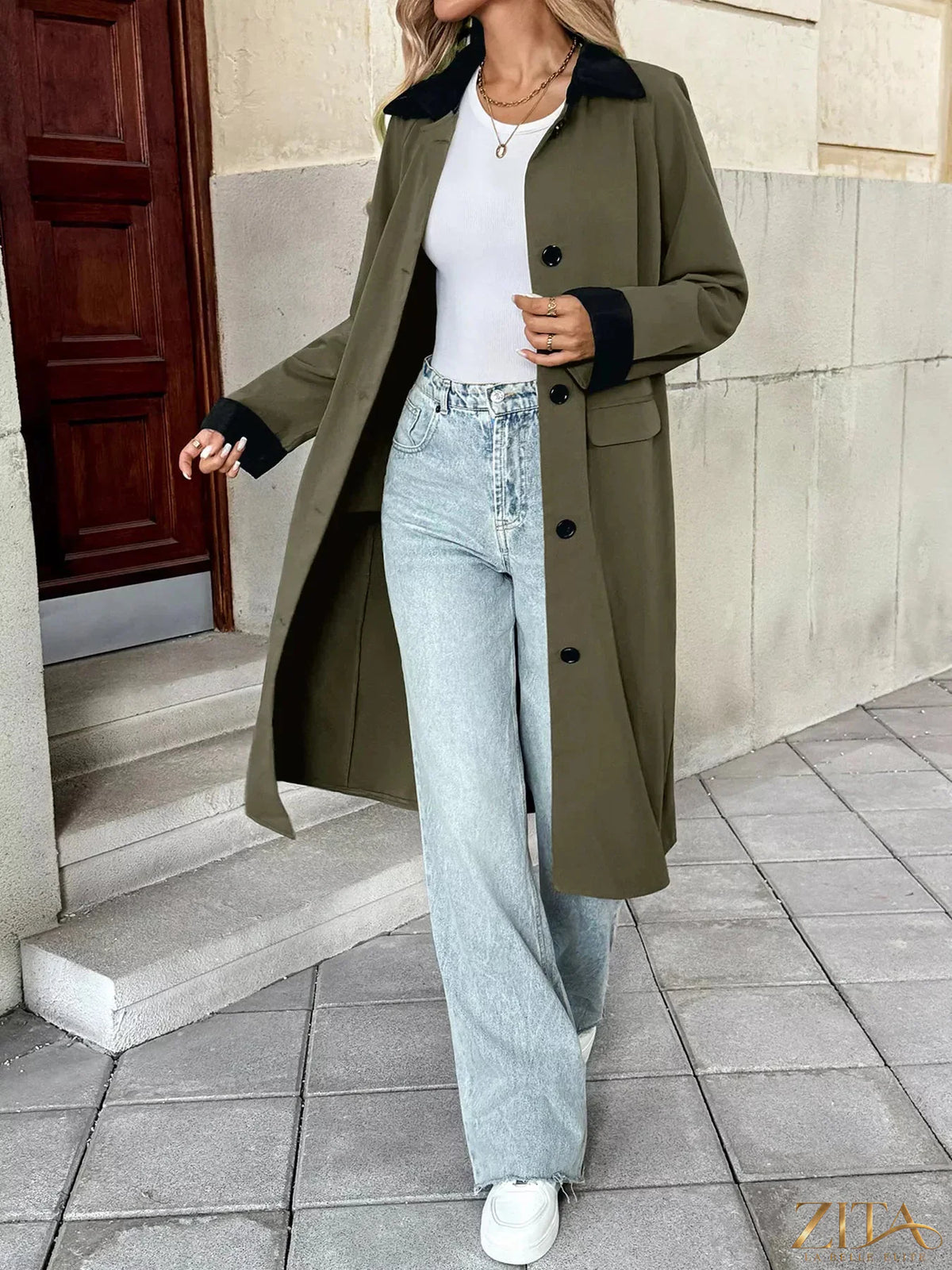 Zita La Belle Elite contrast collar button-up coat showing a stylish navy coat with a white collar and front buttons.