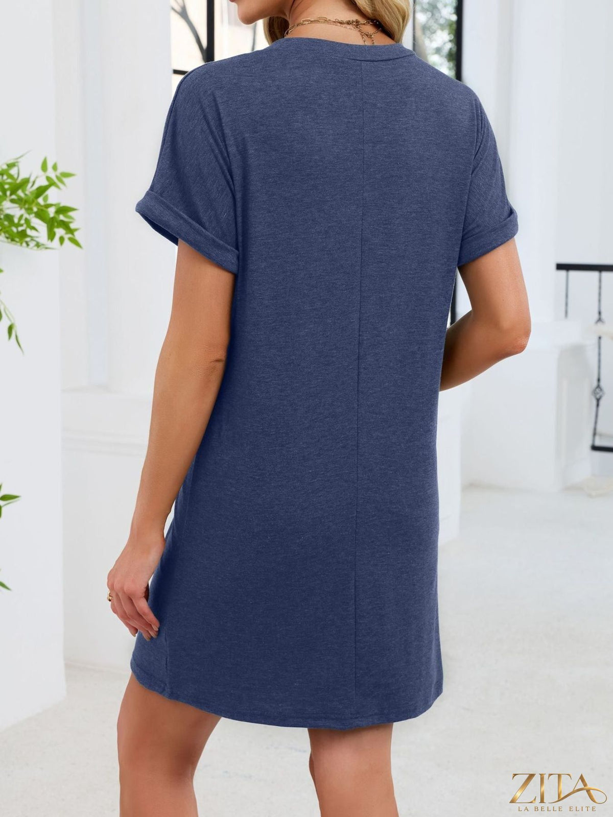 Zita La Belle Elite casual V-neck short sleeve T-shirt dress in soft fabric, shown in a relaxed fit with a simple V-neck design.