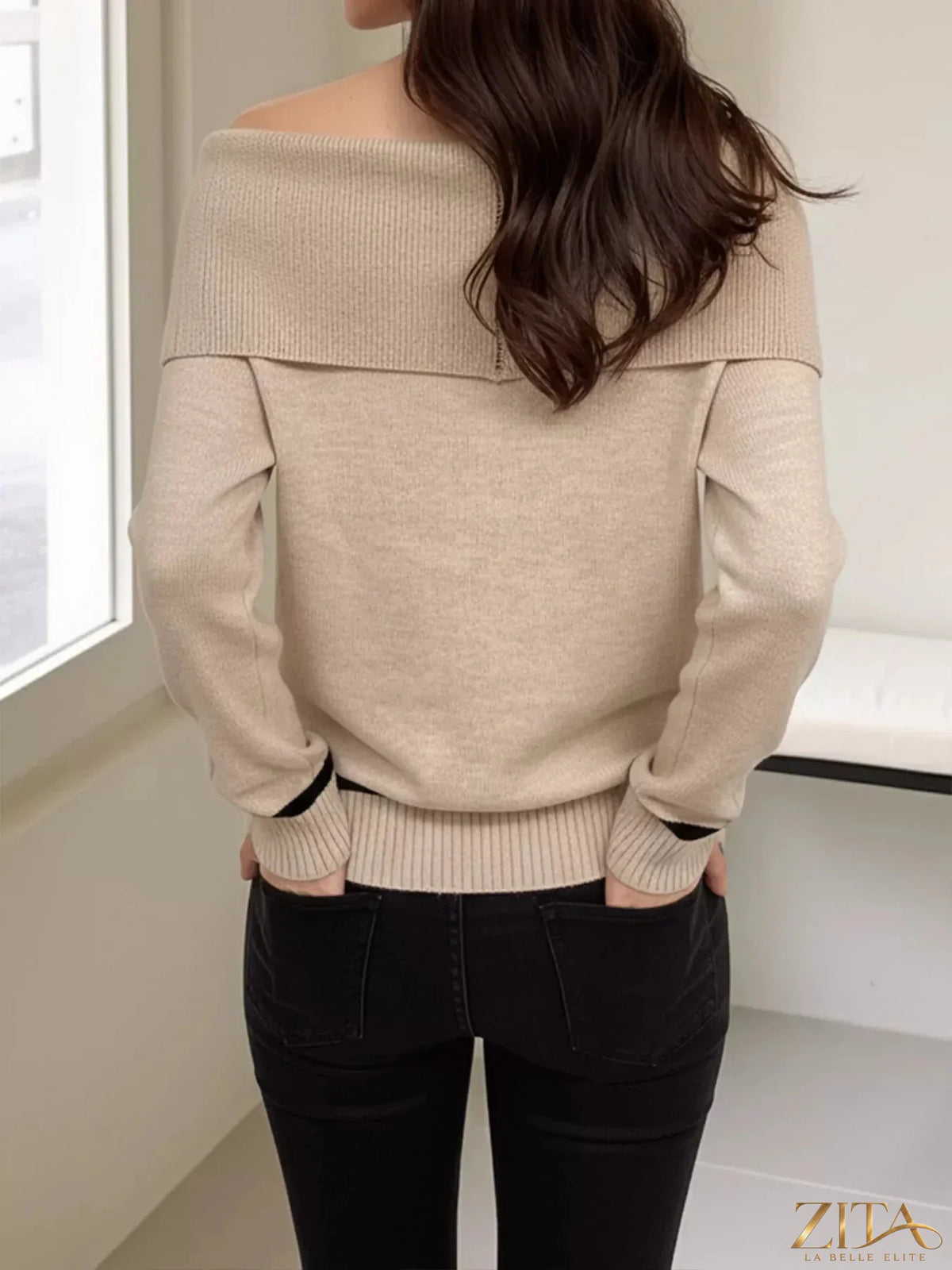 Off-shoulder argyle pattern sweater by Trendsi, featuring a stylish knit design with a relaxed fit and trendy off-shoulder style.