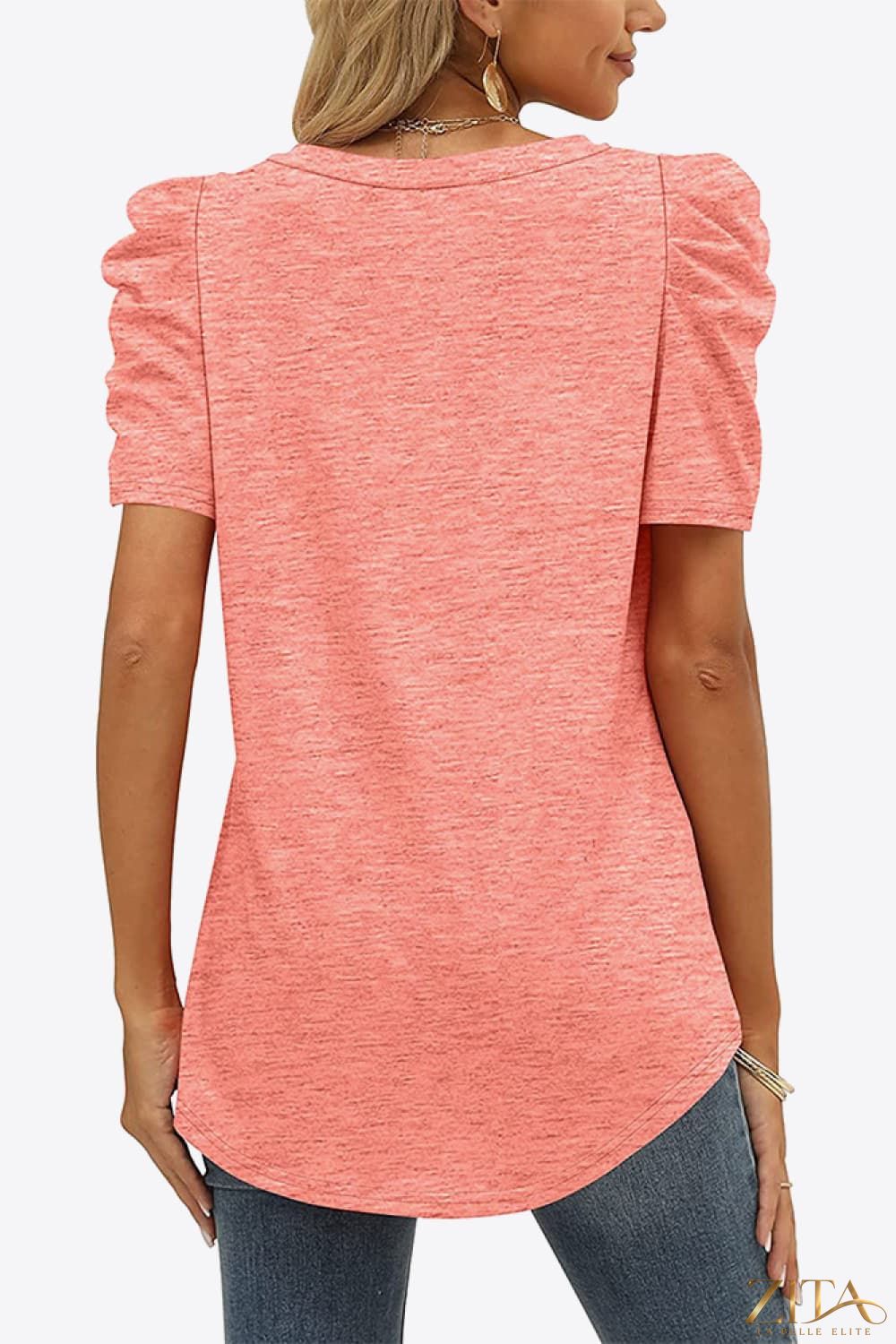 V-neck puff sleeve tee by Trendsi featuring a fitted design and stylish puffed sleeves, shown in a neutral color.