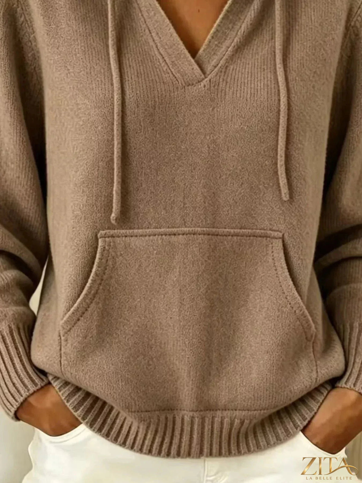 Gray kangaroo pocket hooded sweater by Trendsi, featuring a front pouch pocket and adjustable hood, casual and cozy for everyday wear.