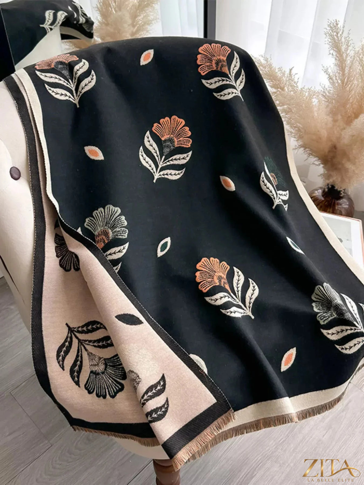 Printed raw hem shawl by Zita La Belle Elite featuring intricate patterns and soft fabric, draped elegantly in the image.