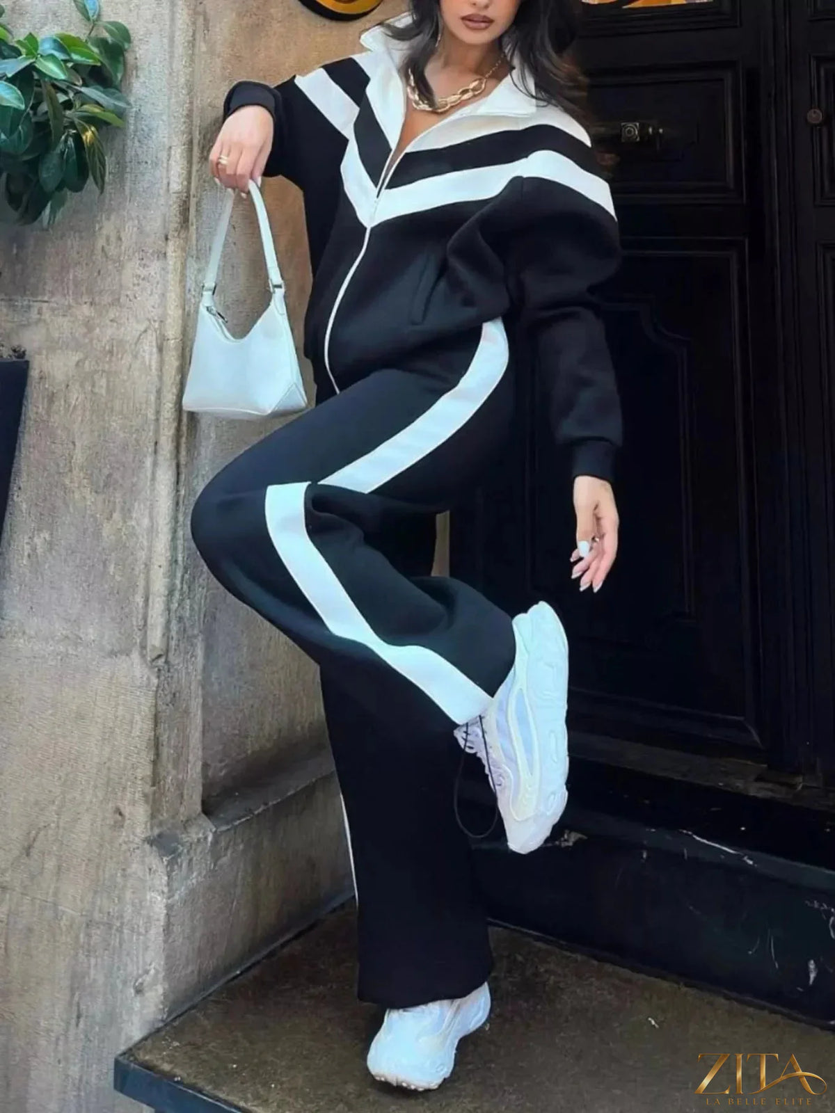 Zita La Belle Elite color block zip-up outerwear and pants set, featuring bold color blocks and a sporty fit.