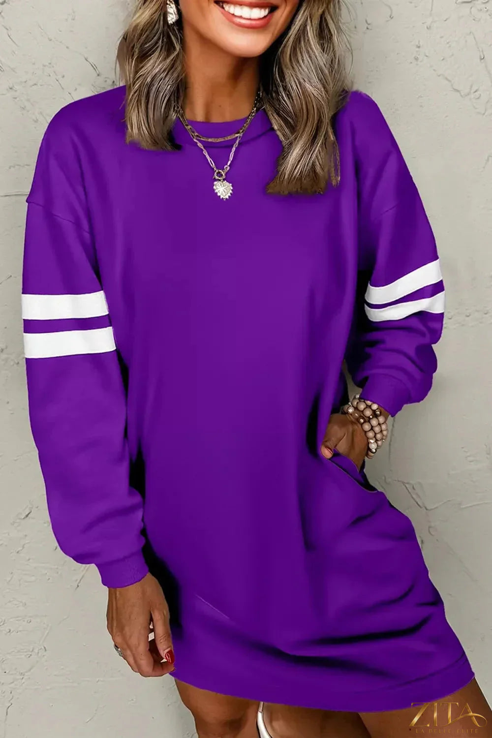 Zita La Belle Elite stripe long sleeve casual sweatshirt dress with a relaxed fit and ribbed cuffs, displayed on a hanger.