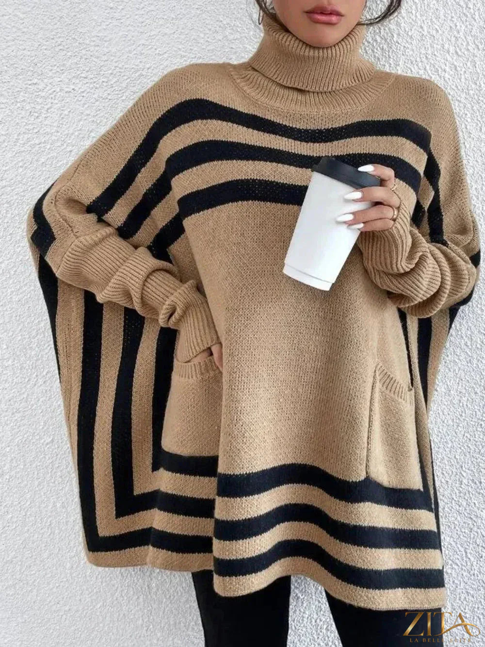 Striped turtleneck batwing sleeve sweater with pockets by Trendsi, featuring a cozy knit design and bold horizontal stripe pattern.
