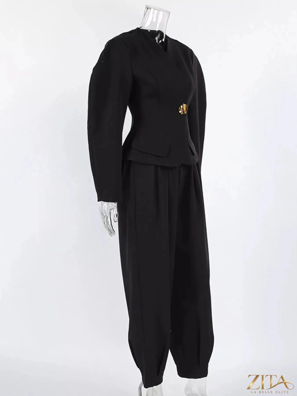 Zita La Belle Elite puffy sleeve blazer and wide-leg pants set in stylish fabric, displayed on a hanger.