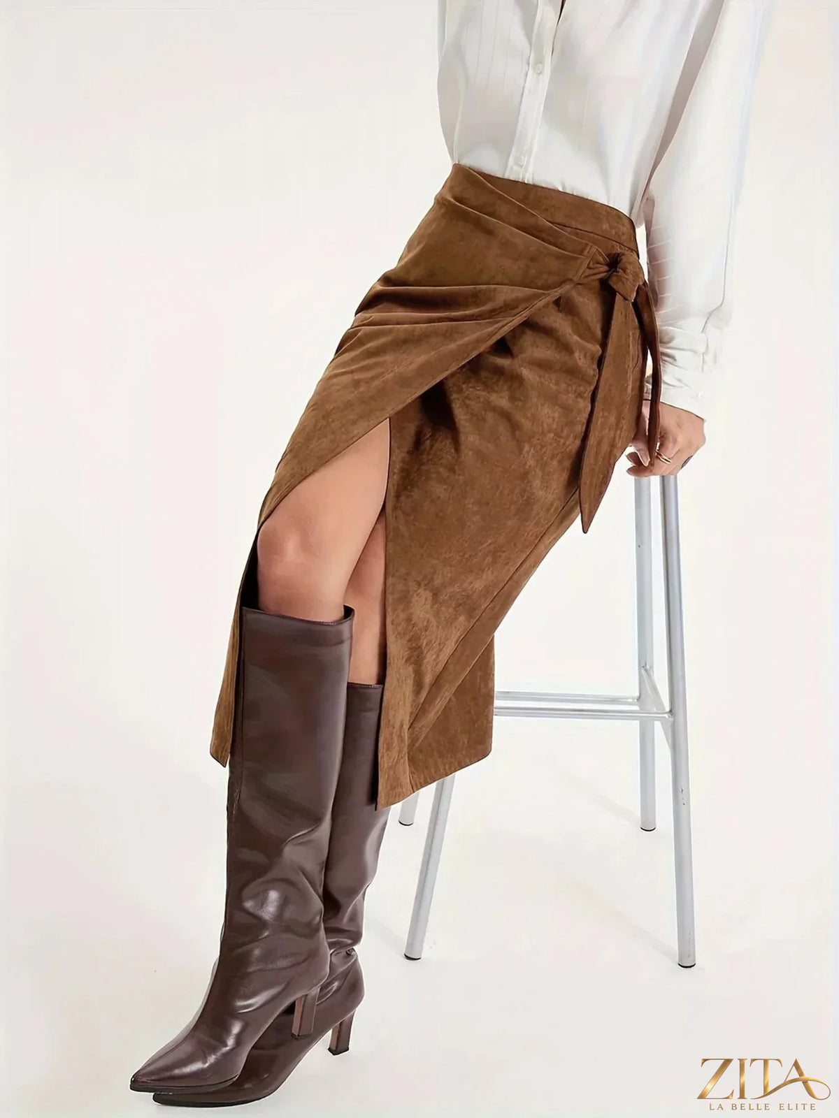 Trendsi wrap midi skirt in soft fabric with a tie waist and flowing silhouette, styled for a casual or dressy look.