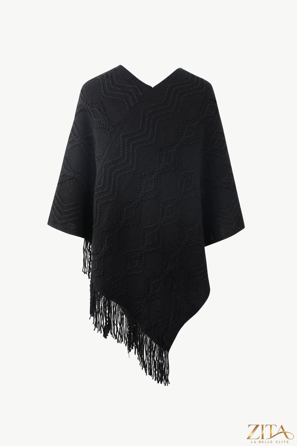 Pearl trim V-neck fringe hem poncho in soft fabric, featuring elegant pearl details and flowing fringe for stylish layering.