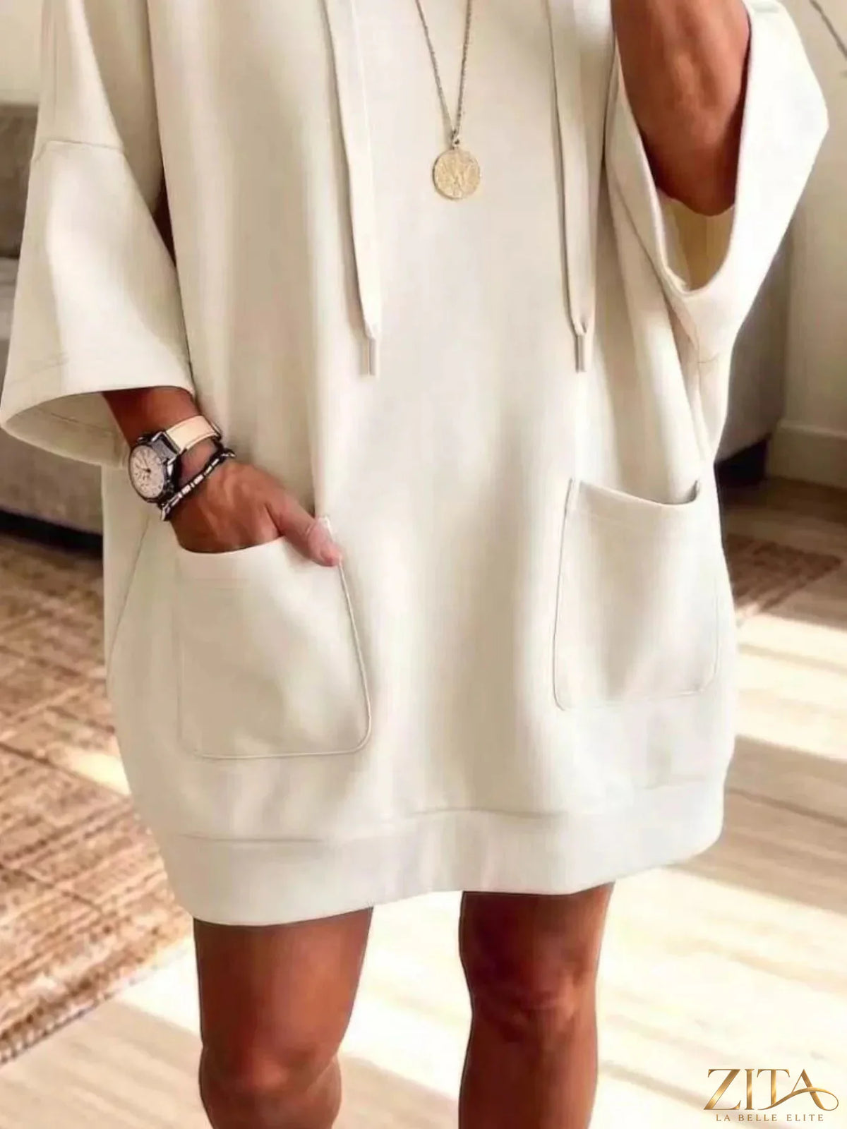 Plus size oversized drawstring hoodie by Zita La Belle Elite with front pockets, shown in a relaxed fit and cozy fabric.
