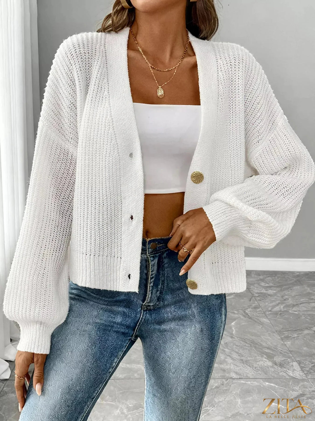 Zita La Belle Elite elegant v-neck button-down ribbed knit cardigan displayed on a model, showcasing its stylish fit and textured fabric.