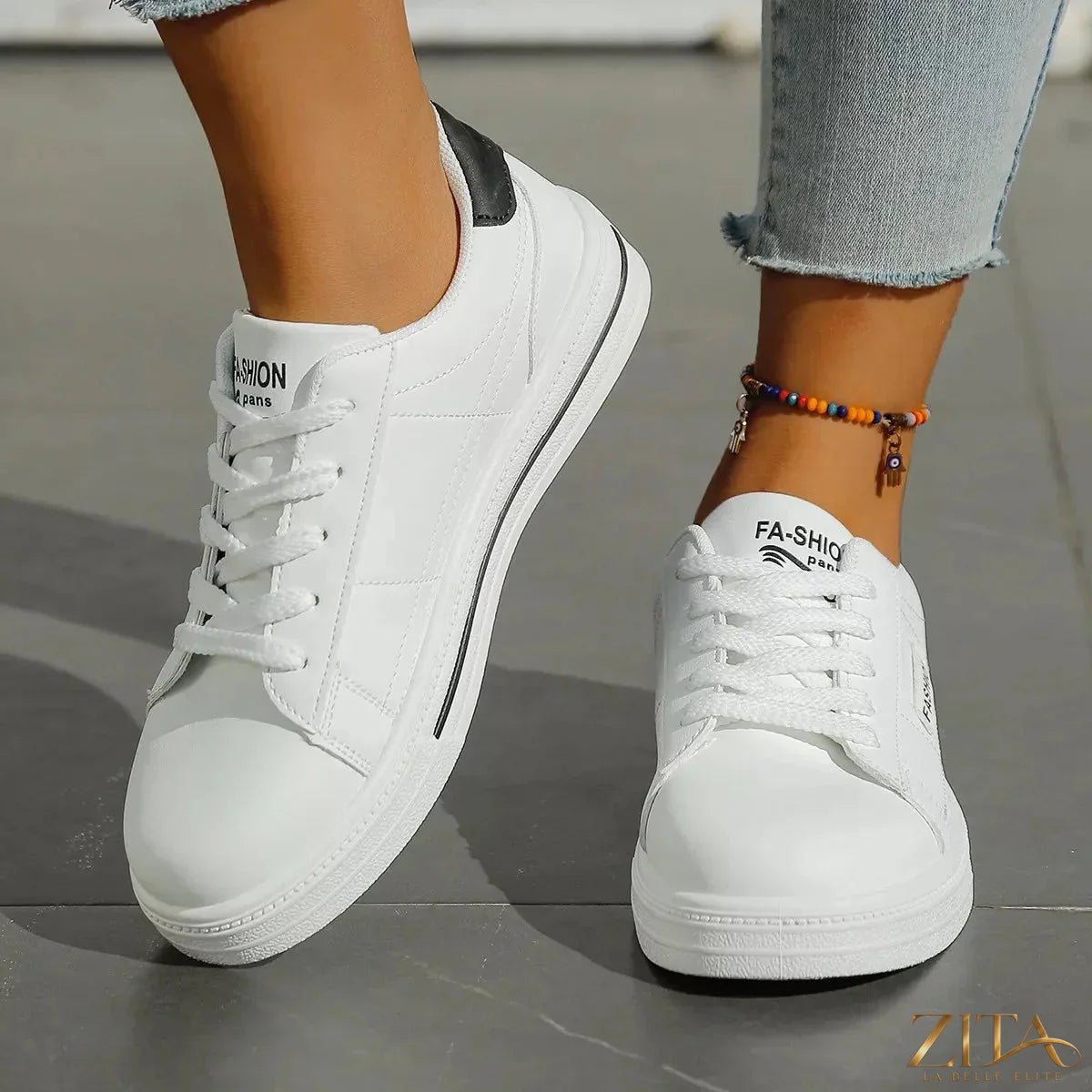 Zita La Belle Elite lace-up casual sneakers featuring white and gray fabric with white rubber soles and stylish design.