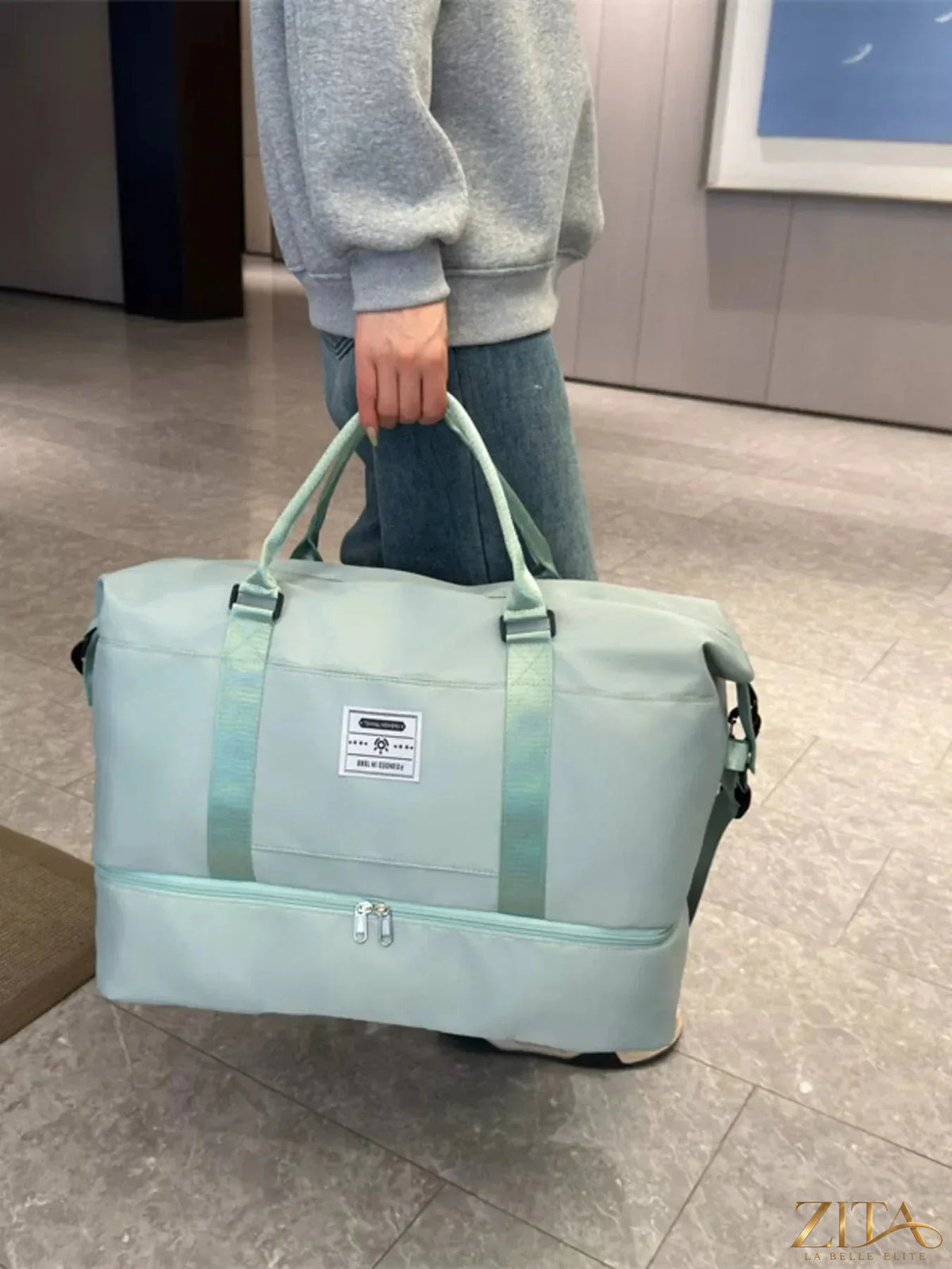 Lightweight Zita La Belle Elite Oxford travel bag with sturdy handles and spacious interior for convenient packing and travel.