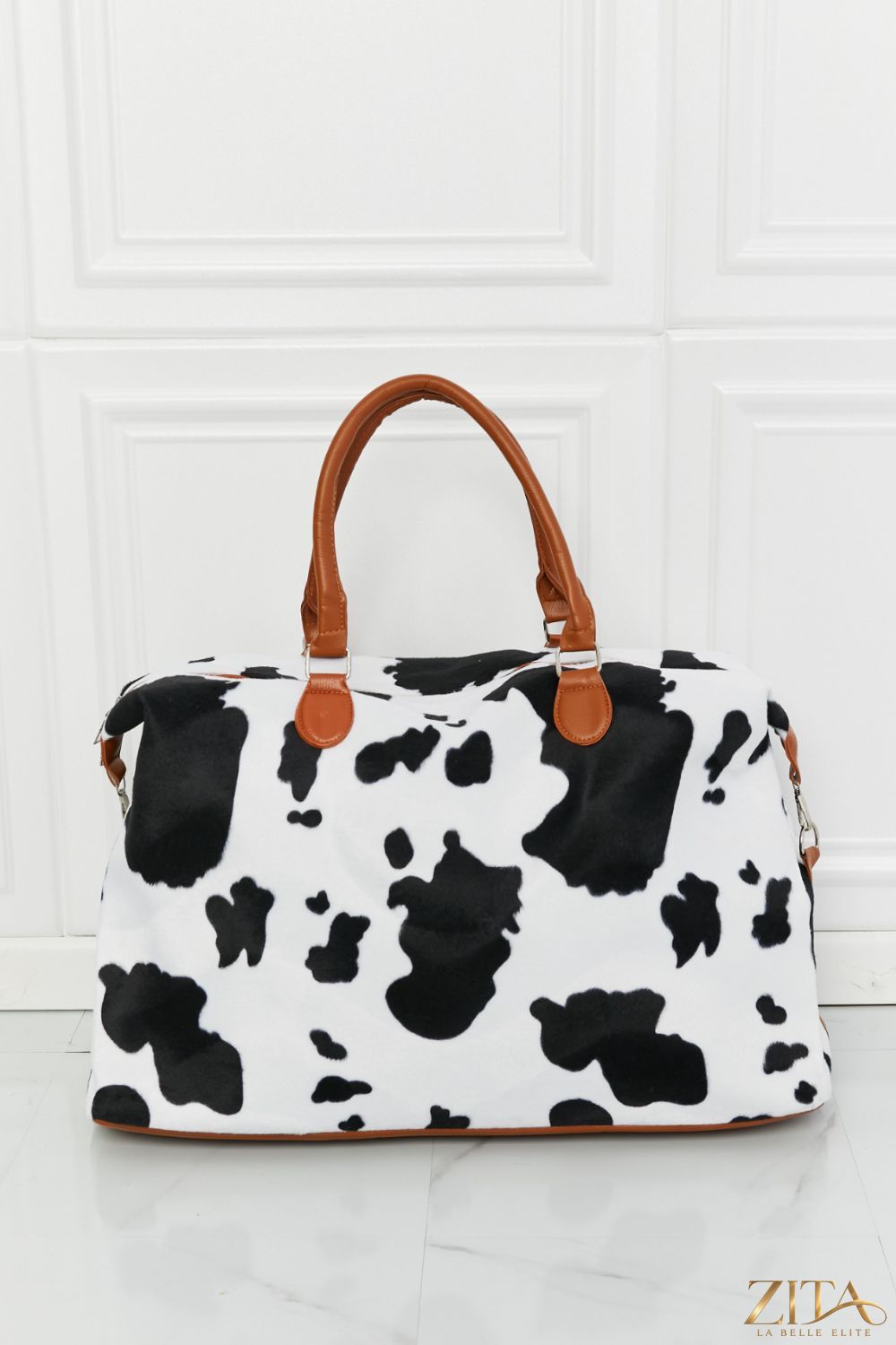 Animal print plush weekender bag by Zita La Belle Elite with soft fabric and spacious design for travel and weekend trips.