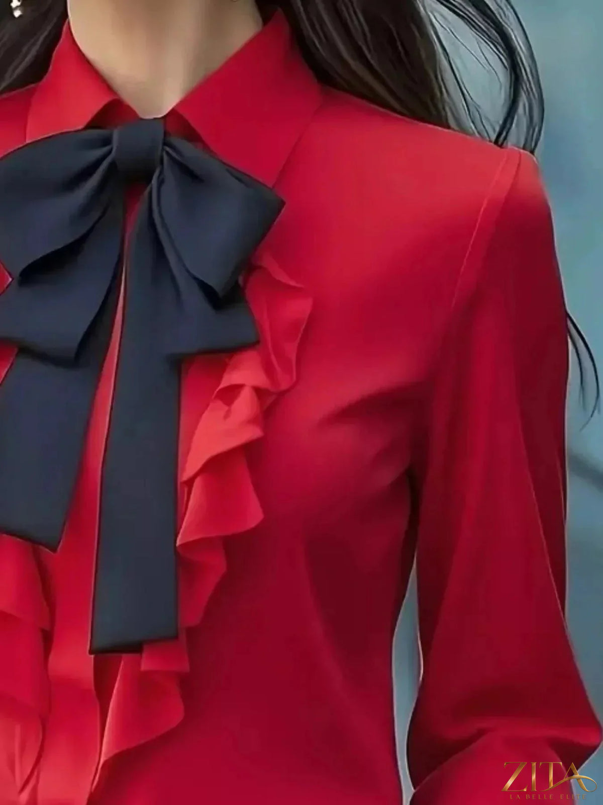 Zita La Belle Elite ruffled tie-front long sleeve blouse with feminine ruffle details and a flattering fit in soft fabric.