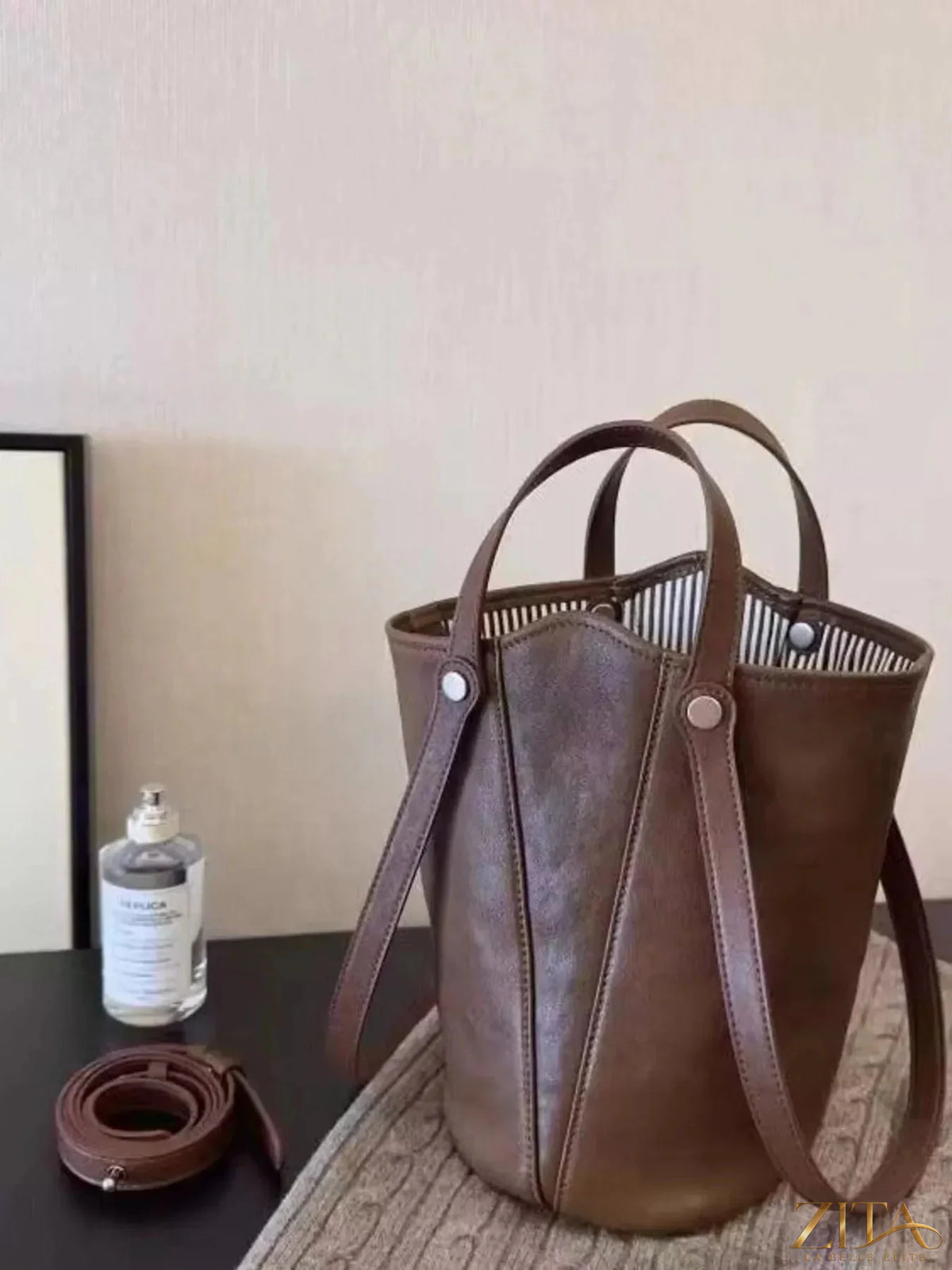Zita La Belle Elite leather bucket tote bag with sturdy handles and spacious interior, stylish for daily use.
