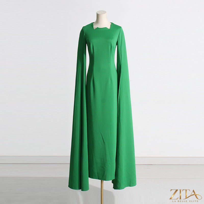 Zita La Belle Elite cape sleeve evening gown with scalloped neckline, fitted design, back slit, and elegant maxi style.