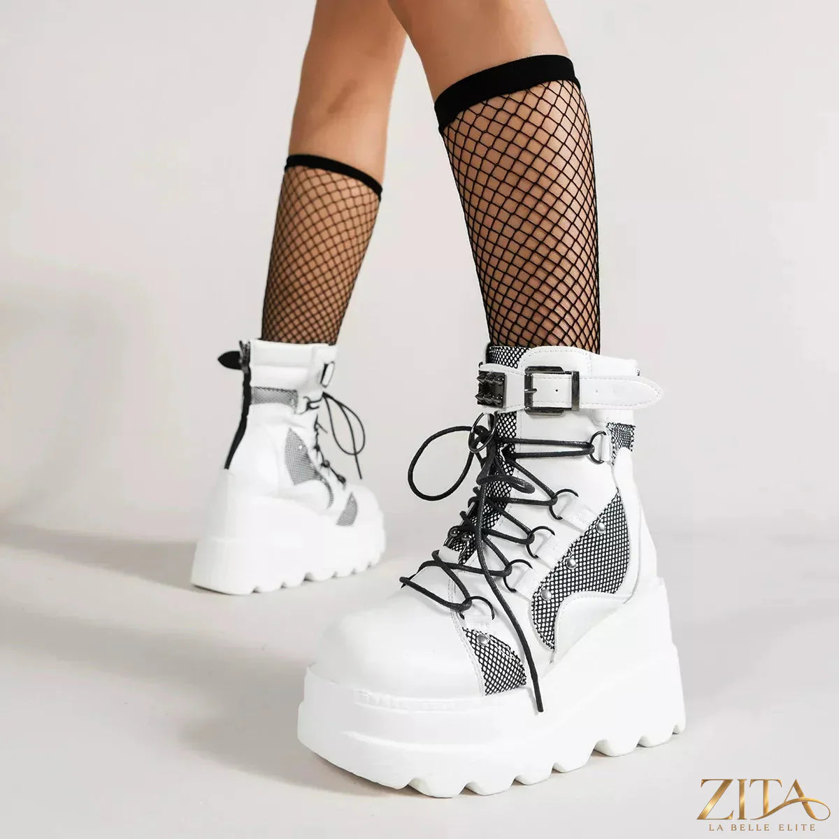 Zita La Belle Elite lace-up platform wedge boots featuring chunky heels and stylish design, shown in a sleek black leather finish.