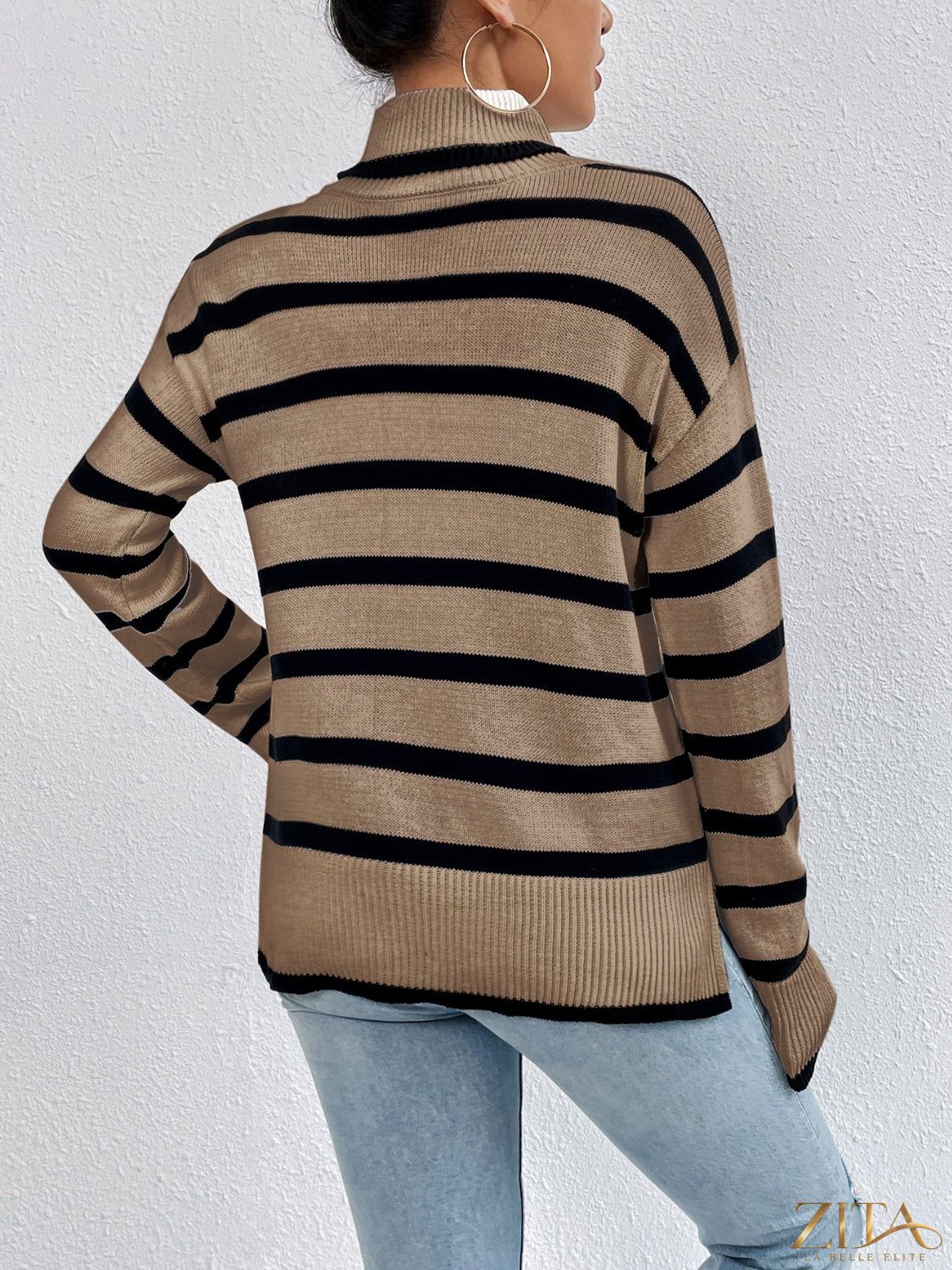Striped turtleneck drop shoulder sweater by Trendsi, featuring a cozy fit with bold stripe pattern and ribbed collar.