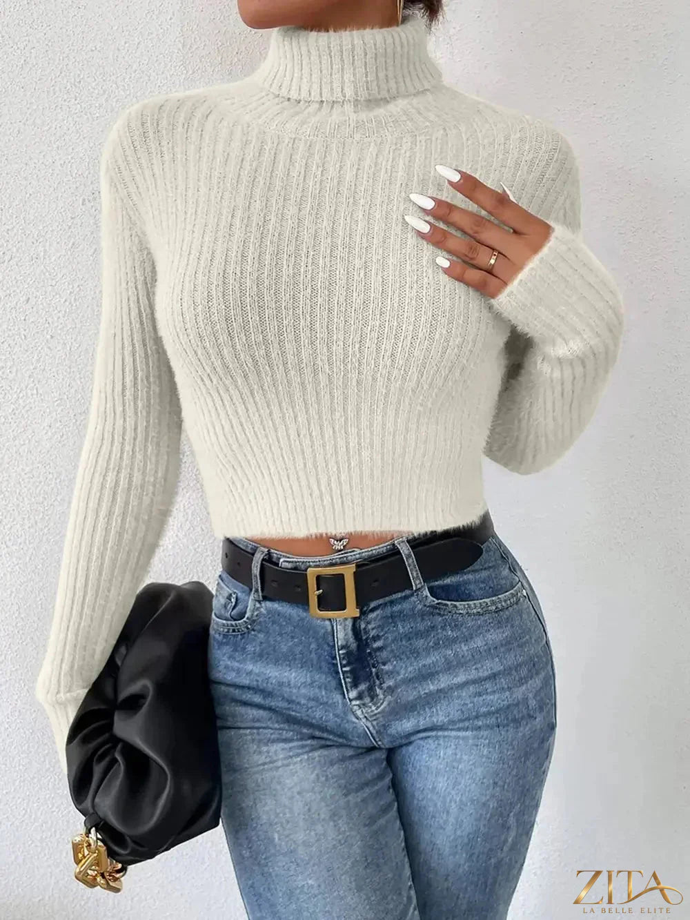 Ribbed turtleneck long sleeve sweater by Trendsi, shown in a cozy knit fabric with a fitted silhouette and classic turtleneck design.