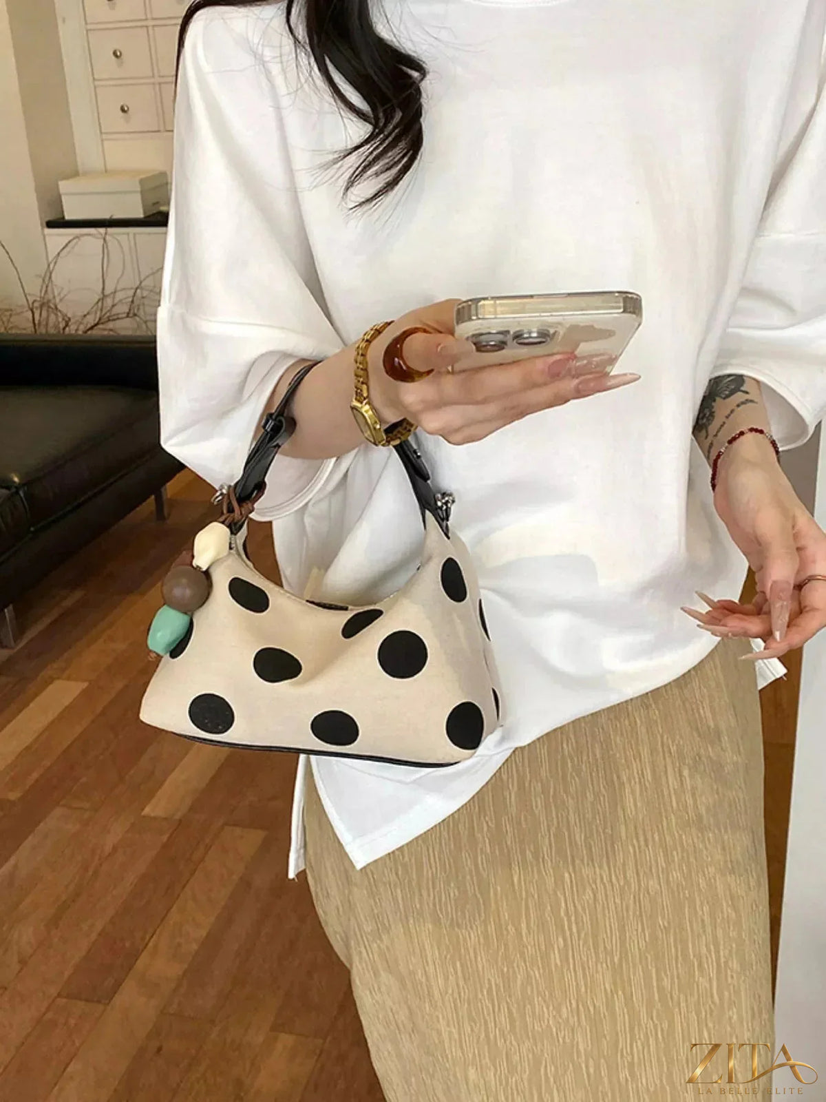 Polka dot PU leather handbag by Zita La Belle Elite with black and white design, featuring top handles and stylish detailing.