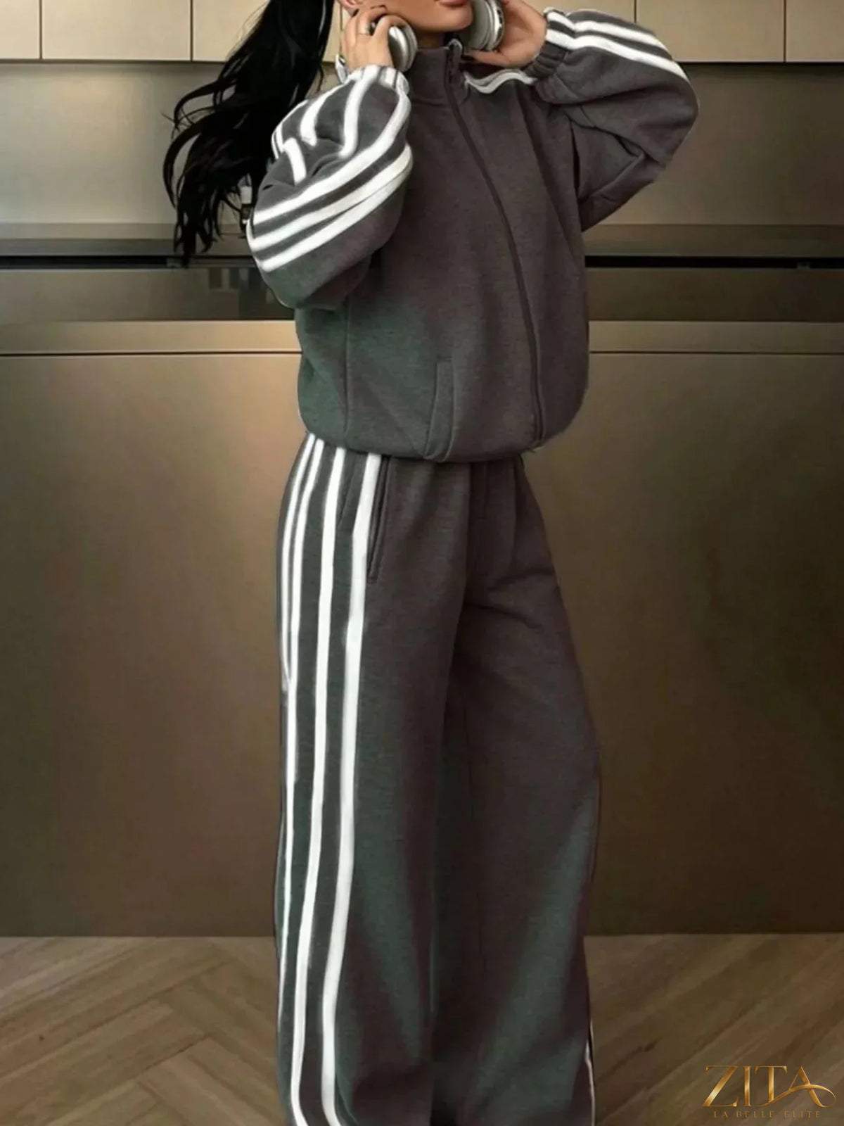 Zita La Belle Elite side stripes zip-up top and matching pants set, featuring sporty style with striped accents and a fitted design.