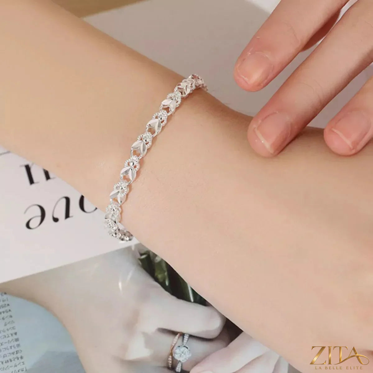 925 Sterling Silver Chain Bracelet featuring a delicate, linked design on a neutral background