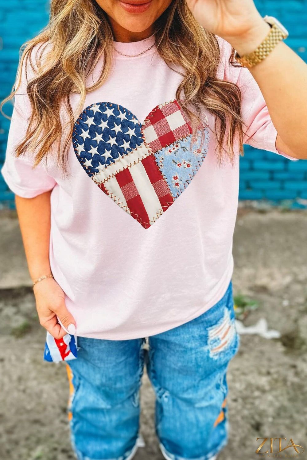 Red, white, and blue patriotic heart round neck T-shirt by Trendsi, featuring a colorful heart design on a casual tee.