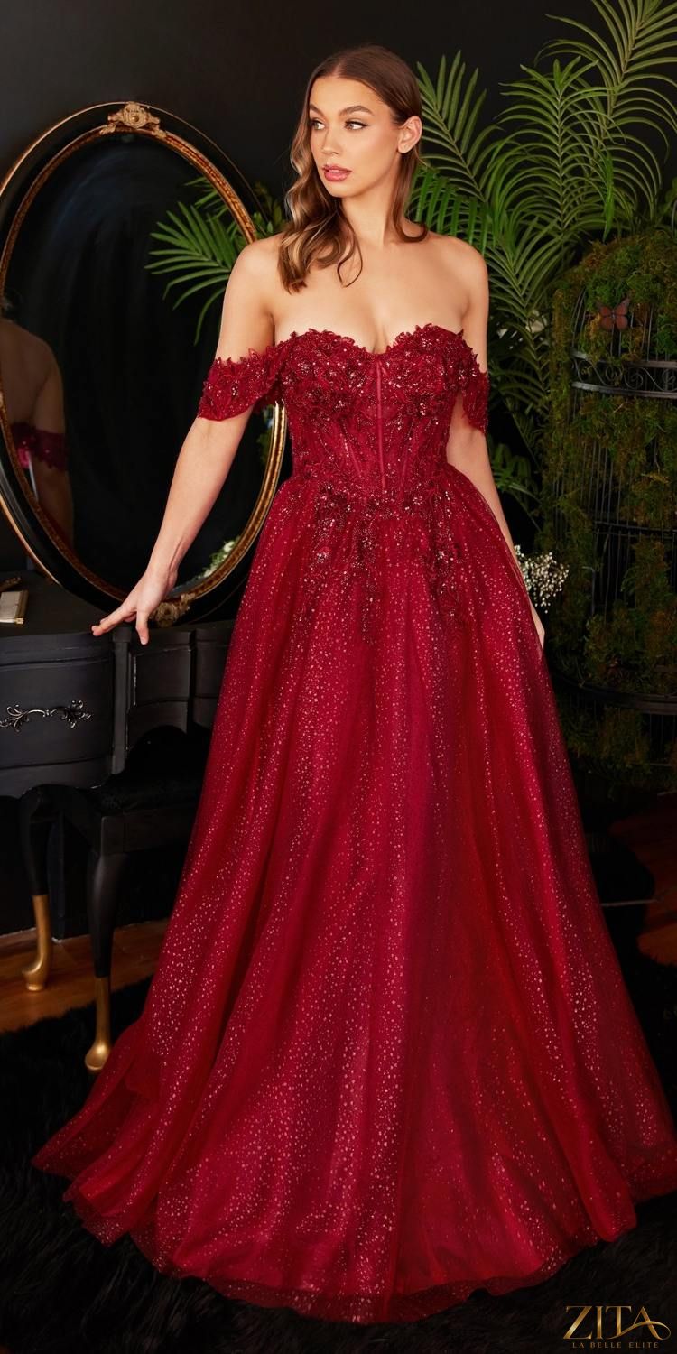 Burgundy Cinderella Divine CD0198 off-shoulder lace A-line gown by Zita La Belle Elite, displayed on a hanger.
