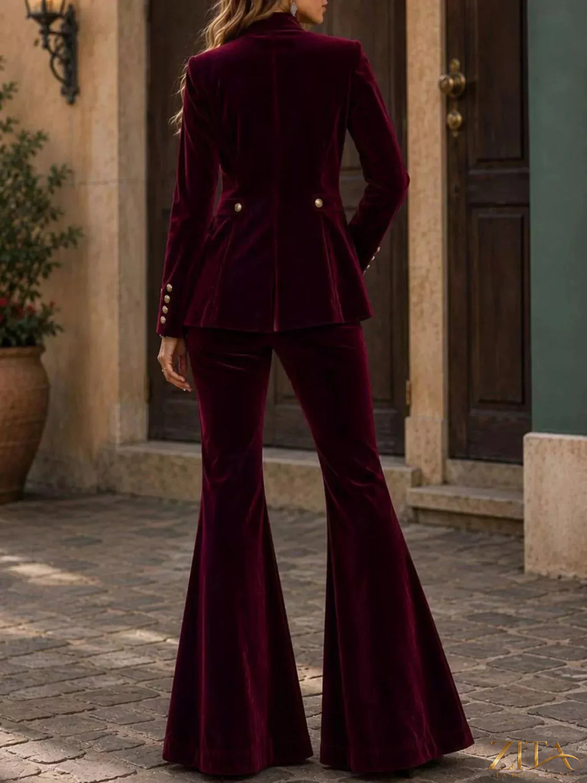 Velvet double-breasted blazer and flare pants set by Zita La Belle Elite, featuring a stylish tailored fit and rich texture.