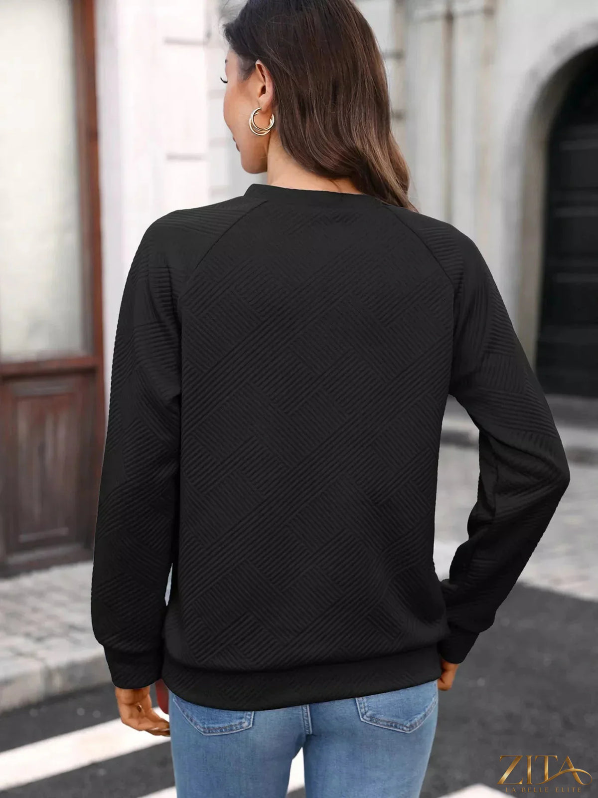 Textured notched long sleeve sweatshirt by Zita La Belle Elite, featuring a stylish design and comfortable fit.