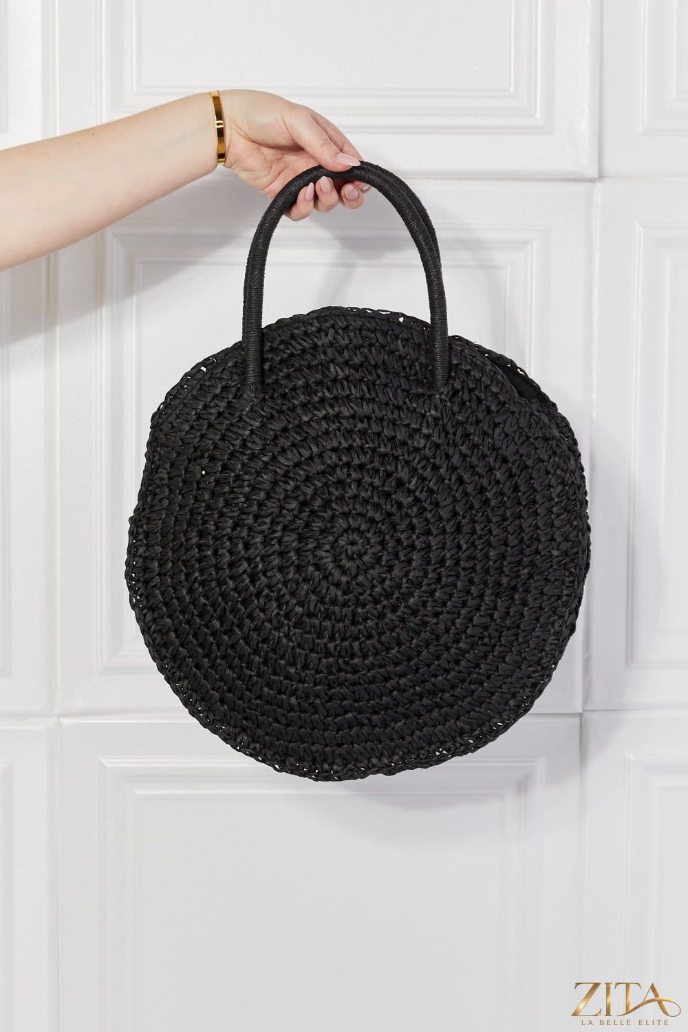 Justin Taylor Beach Date straw rattan handbag in black with woven design, stylish Zita La Belle Elite accessory for summer and beach outings.