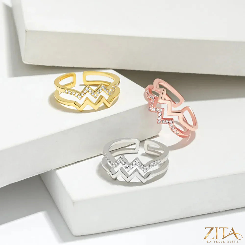 Zita La Belle Elite wave-shaped open ring with inlaid zircon stones, featuring a sleek and elegant design.